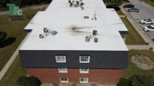 Flat roof commercial roofing project by Total Roofing and Construction